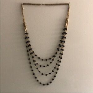 Elegant Gold and Black Beaded Necklace